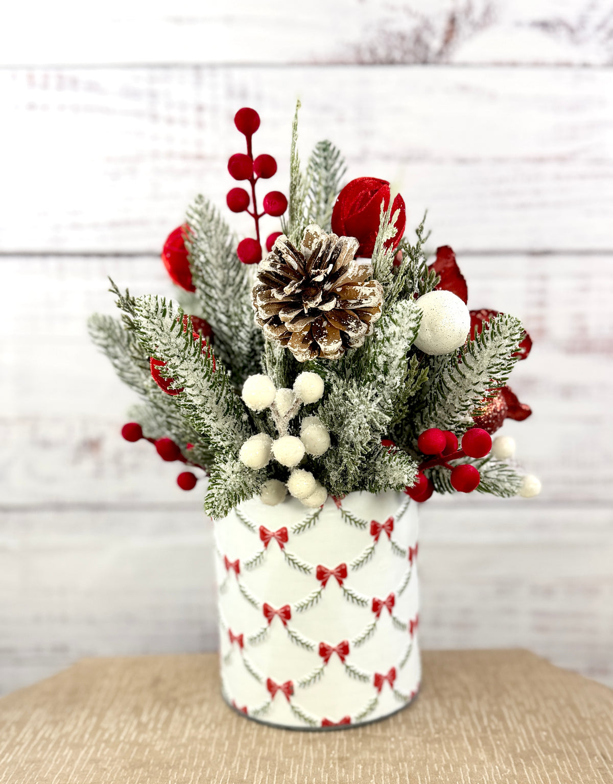 Rear view of frosted evergreen and Christmas accents