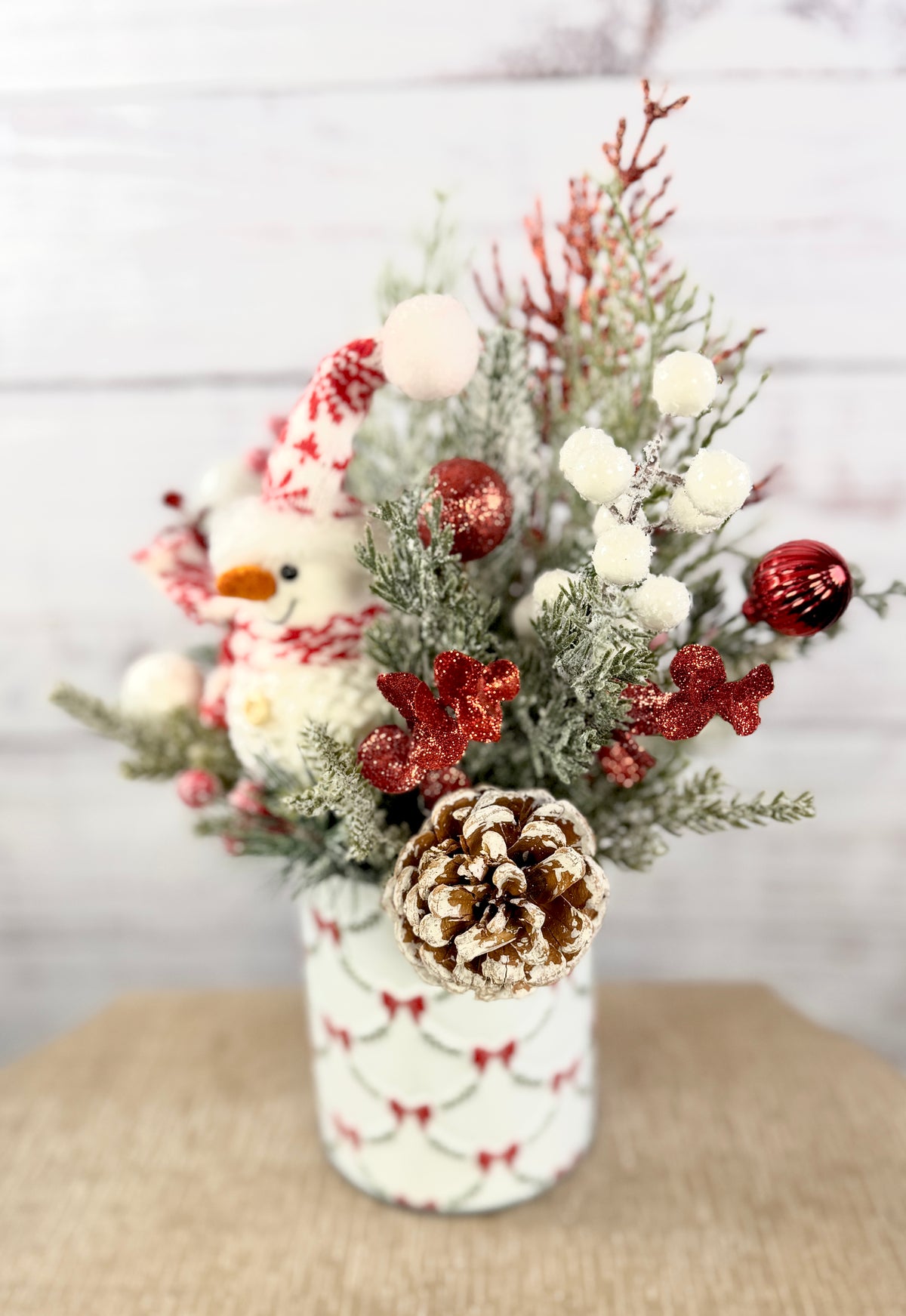 Pinecone and red ornament detail