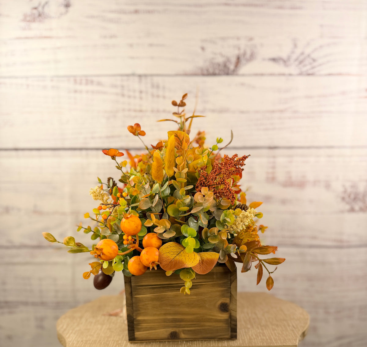 Amber Dahlia Harvest orange floral arrangement in a rustic wood box