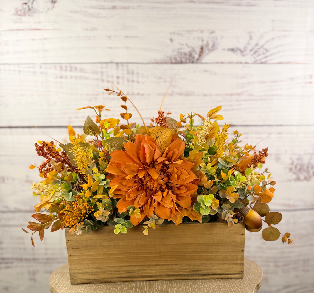 Amber Dahlia Harvest orange floral arrangement in a rustic wood box