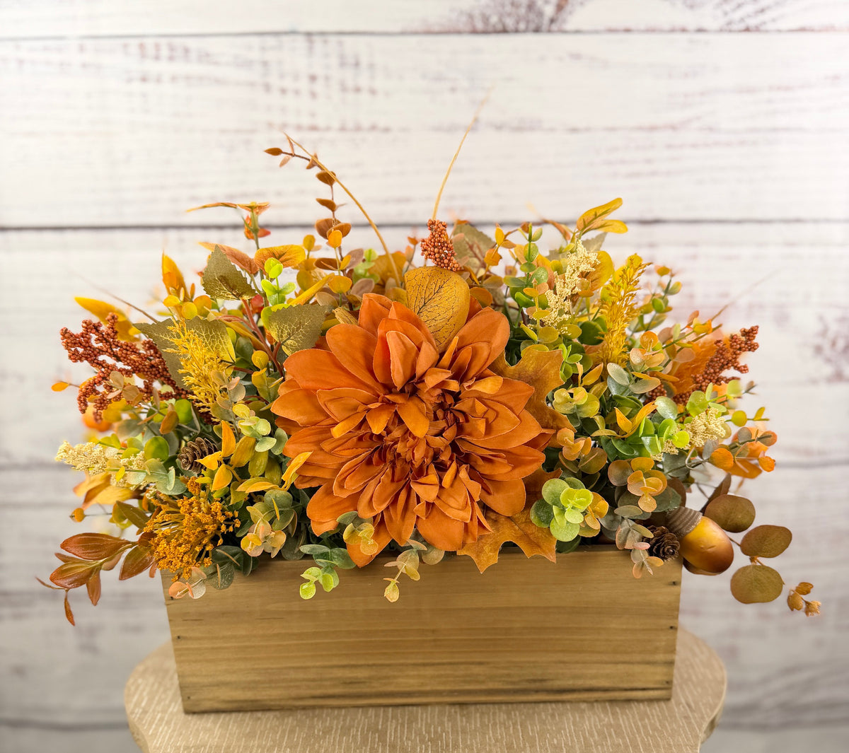 Amber Dahlia Harvest orange floral arrangement in a rustic wood box