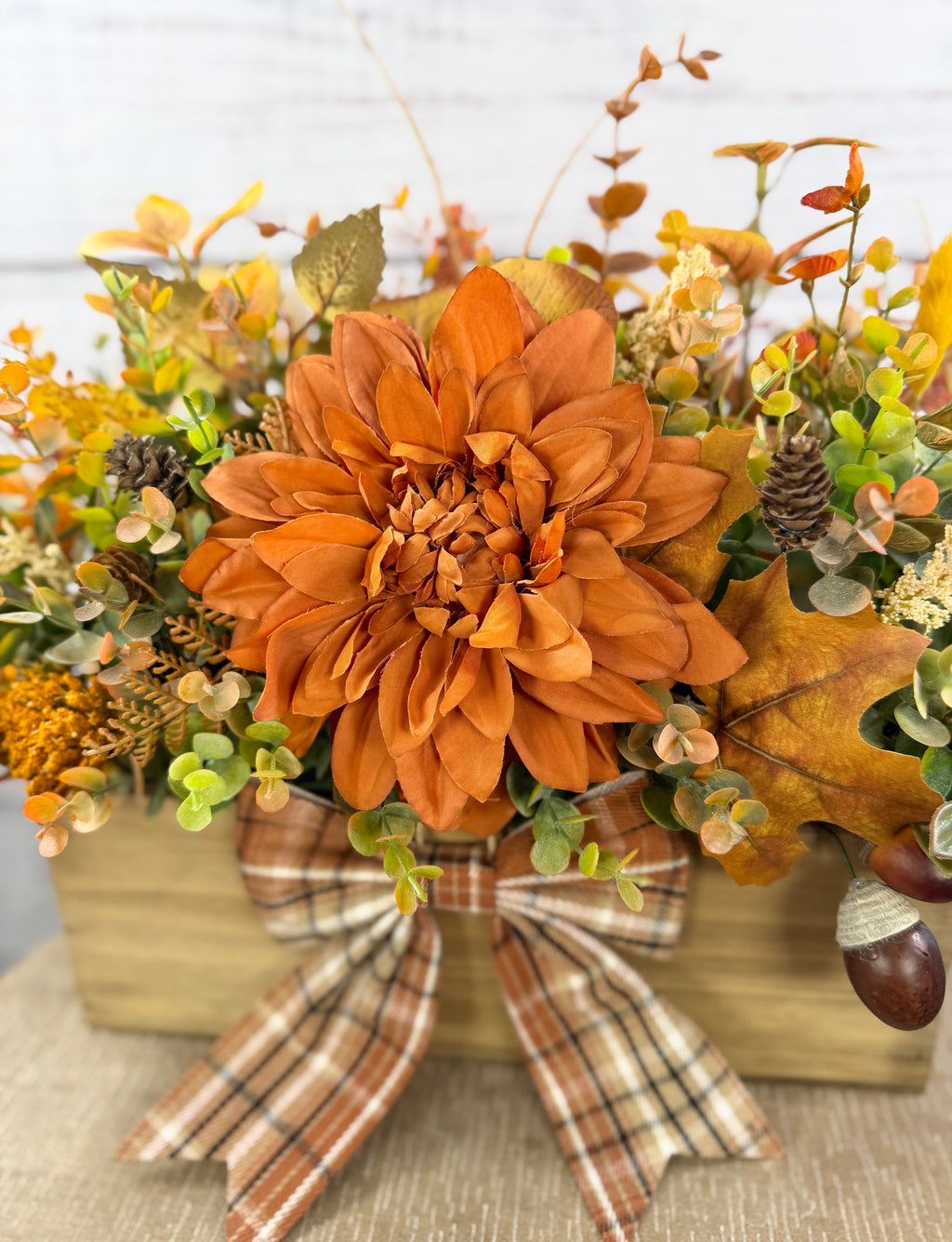 Amber Dahlia Harvest orange floral arrangement in a rustic wood box