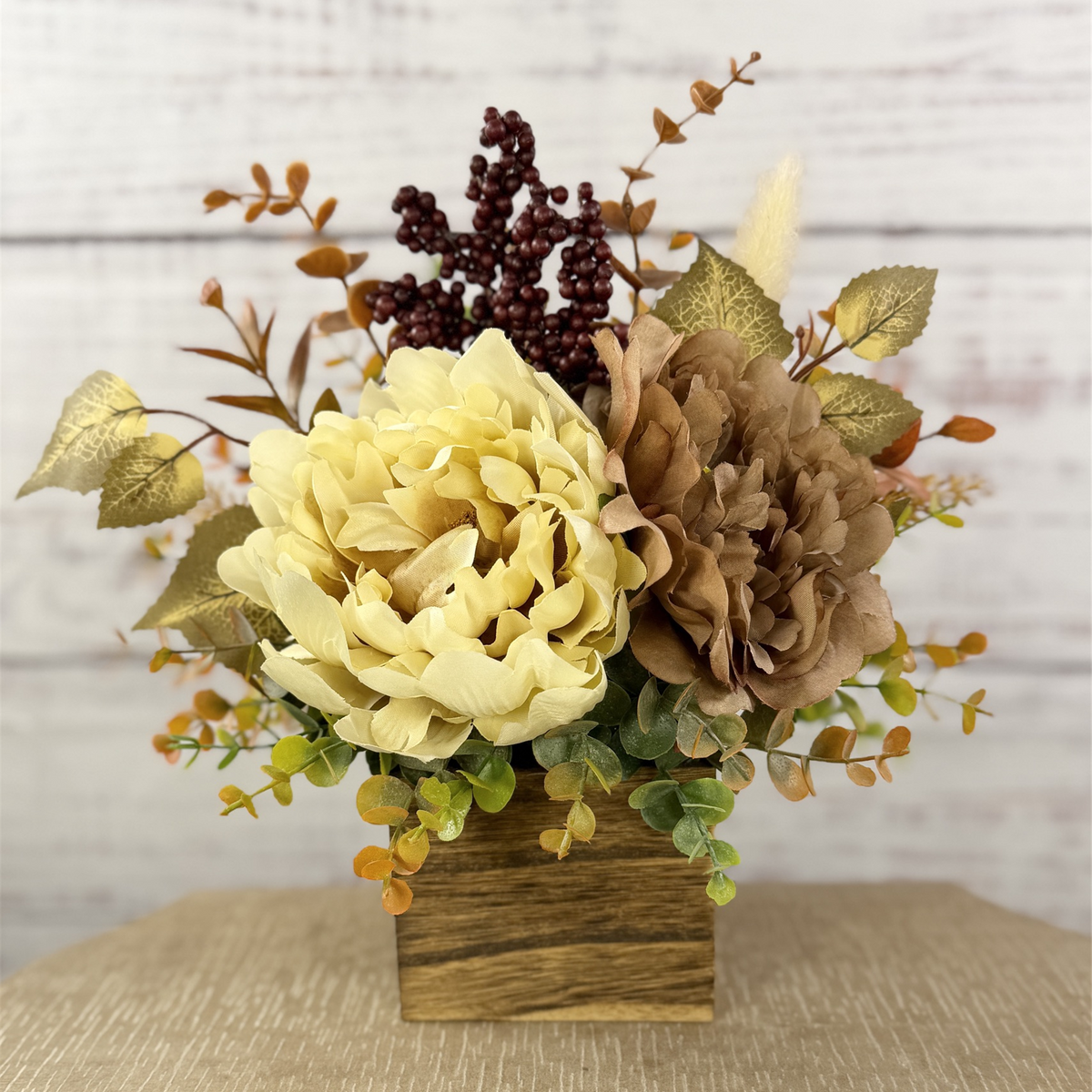 Buttercream & Cocoa fall floral arrangement in a rustic wood cube, cream and cocoa-brown blooms with burgundy berries, view 1 — cropped main photo