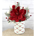 Crimson & Snow red magnolia Christmas arrangement in a festive metal tin