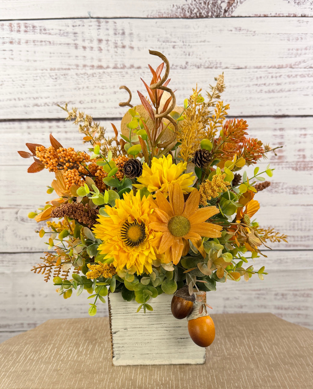 Golden Acorn fall floral arrangement in a whitewashed wood cube