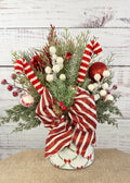 Candy cane Christmas arrangement in bow and garland tin, full front view