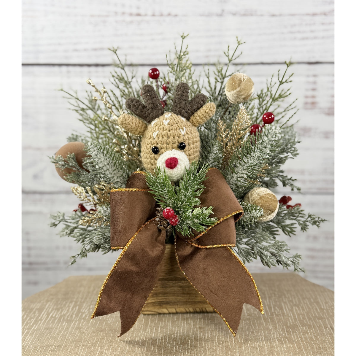 Woodland reindeer Christmas arrangement in rustic wood cube with brown and gold bow
